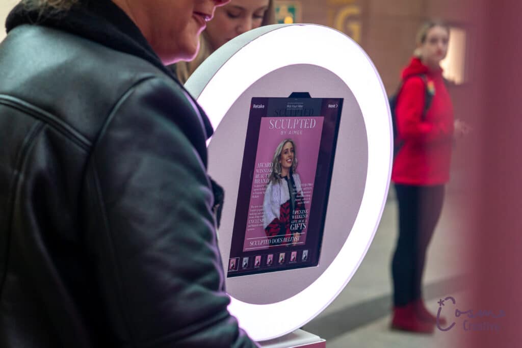 The Mobi Aura booth set up at a corporate event taking photos of guests