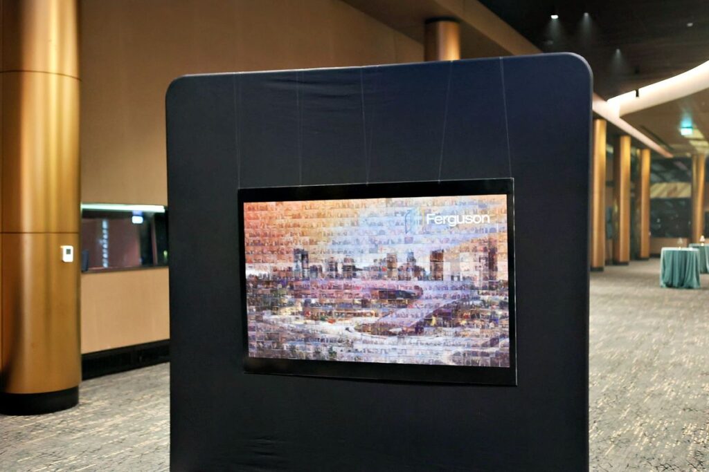 Mosaic artwork displaying a cityscape created from guest photos at an event, featuring the name "Ferguson" prominently.