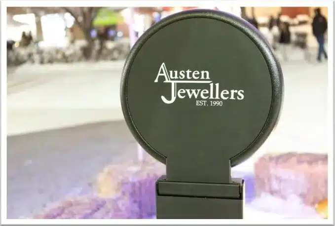 Austen Jewellers branded photo booth at the Light Up Okotoks Festival, showcasing event activation and community engagement.
