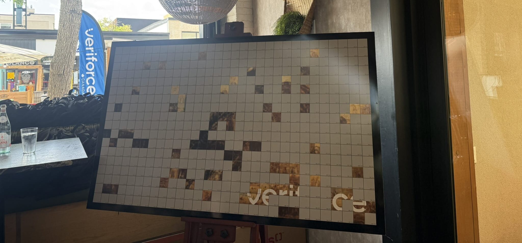 Veriforce Stampede mosaic artwork with individual photo tiles and branding.