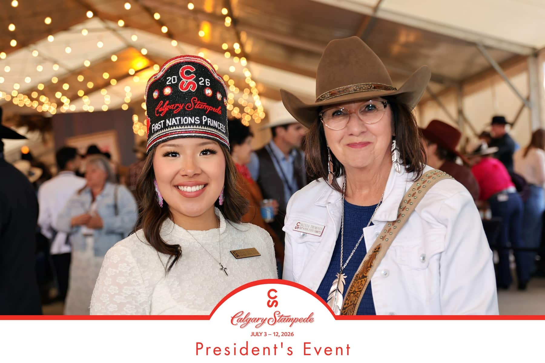 Smiling guests at the Calgary Stampede President's Event, featuring a woman in a decorative hat