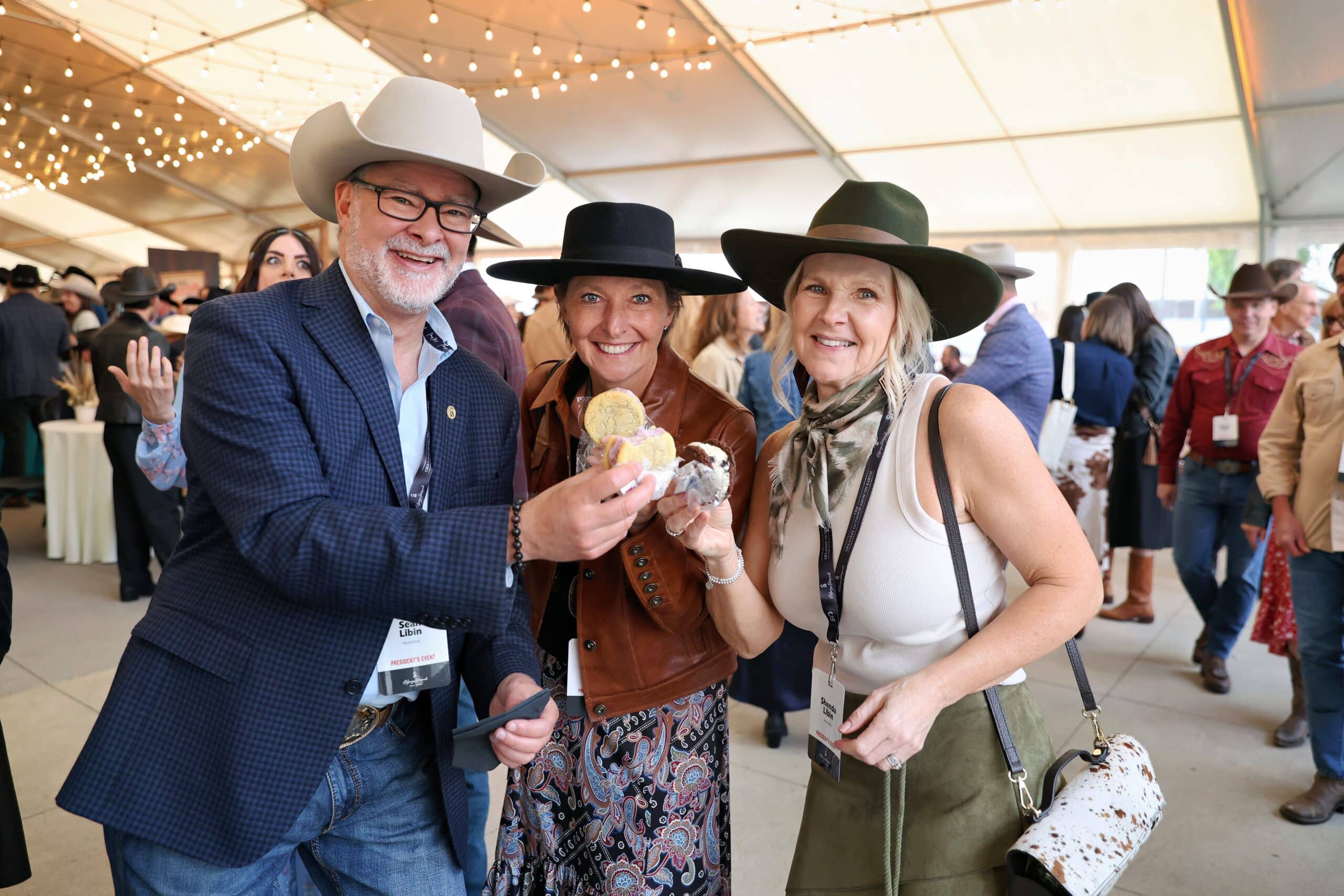 Guests at Calgary Stampede President&rsquo;s Party enjoying AI spice activation and photo opportunities.